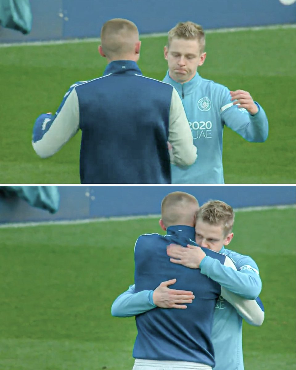 ESPNFC's tweet image. Man City's Zinchenko and Everton's Mykolenko embrace before their Premier League matchup 🇺🇦
