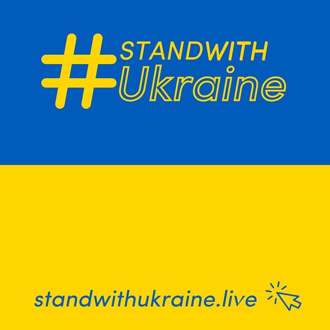 Image with flag of Ukraine in the background and text that reads #StandWithUkraine and stanwithukraine.live