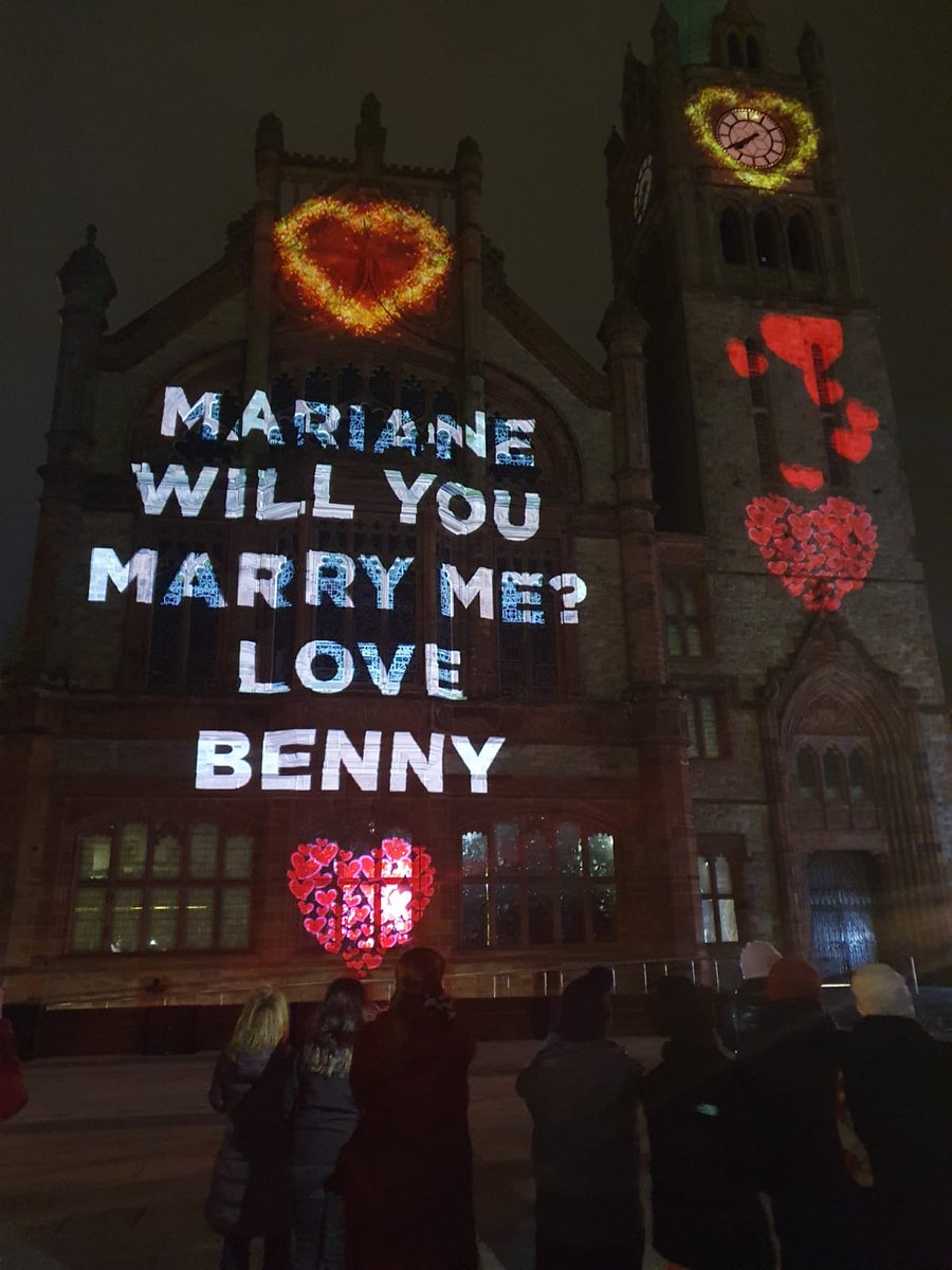 What a magical night – congrats to Benny &amp; Mariane who have just gotten engaged in style at the Illuminate Festival 🍾
Benny called on the Illuminate team &amp; <a href="/_visualspectrum/">Visual Spectrum Studios</a> who put the words 'Mariane will you marry me?' across the Guildhall, and she said yes! 💍
#illuminatederry