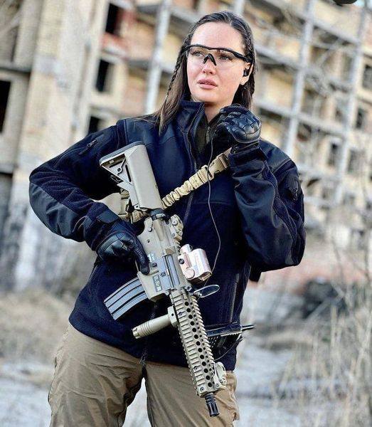 ubco2's tweet photo. "Anastasiia Lenna, winner of the Miss Ukraine beauty pageant, posts says on IG that she is taking up arms and defending her country, and calls on other women with military training to do the same." https://t.co/qLxhFJzmiz