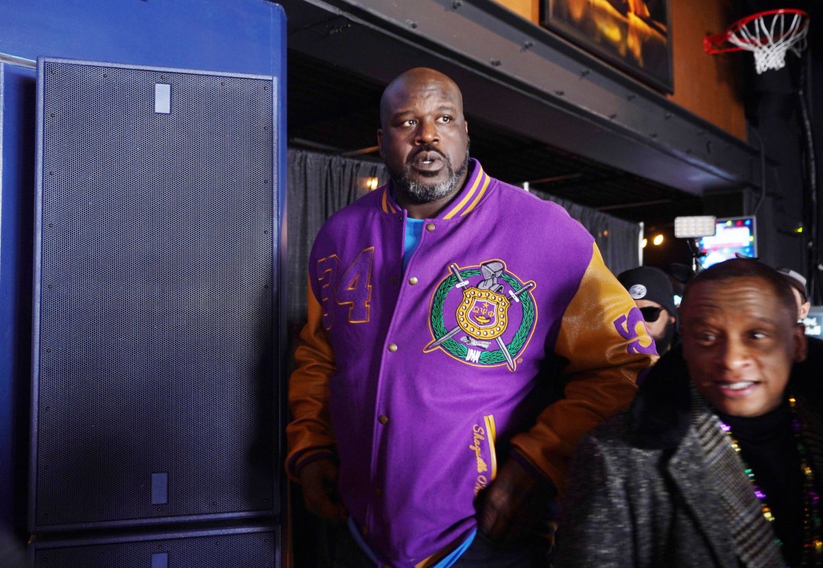Former NBA player Shaquille O'Neal walks through the crowd as he prepares to play D.J. during the Mardi Gras Parade in St. Louis on Saturday, February 26, 2022. Photo by Bill Greenblatt/UPI