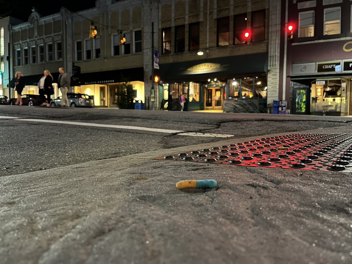 samfranklin1000's tweet photo. Ok. ANOTHER WORM. This one at the corner of Aston St and Biltmore Ave, 8:10pm Tuesday. That’s right - After a 3.5 year wild worm drought it was two worms in two days!!! 🔥🔥 What is happening!? #wormsareback #gummyworms #hotstreak https://t.co/WZCalA6Pbd