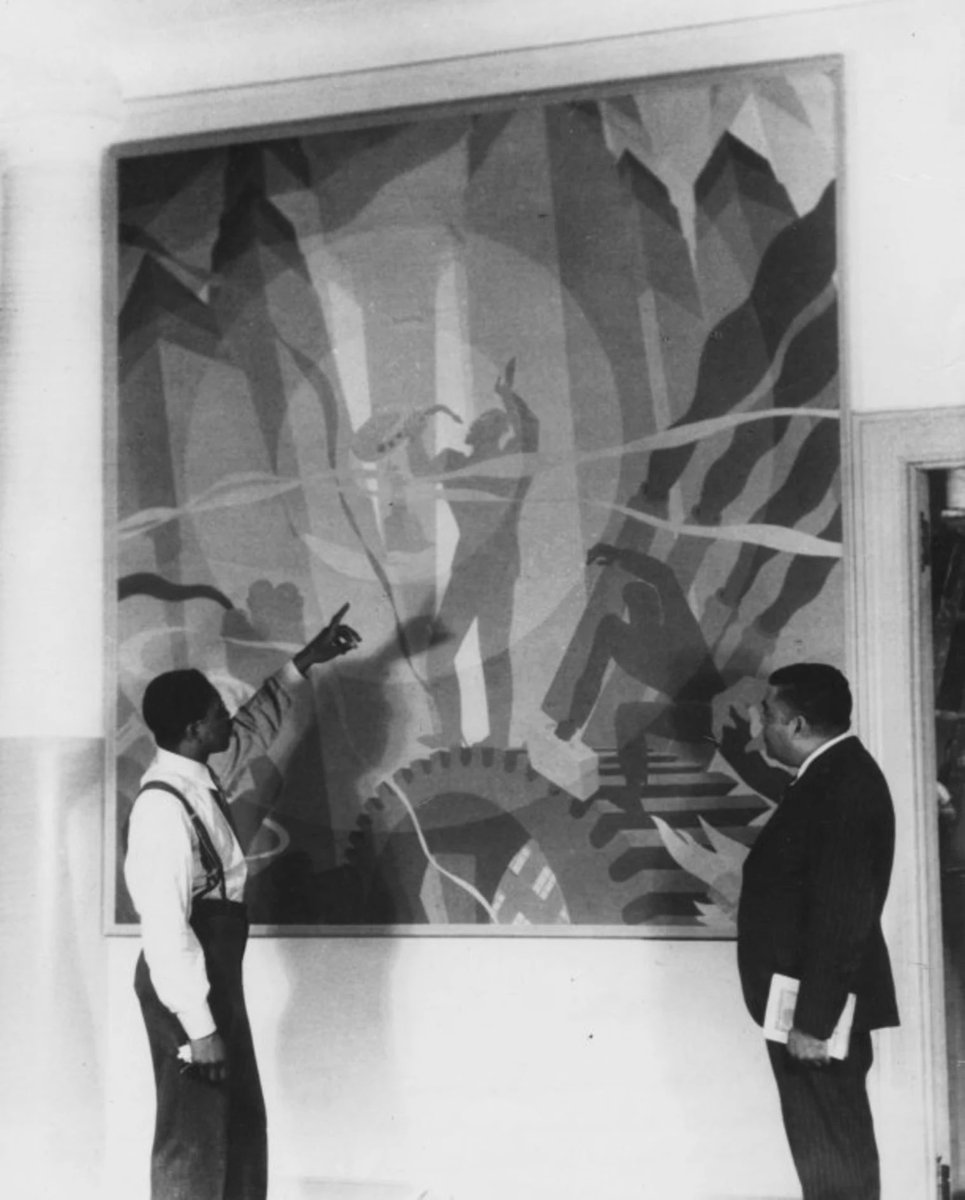 Artist Aaron Douglas, left, shows Arturo Alfonso Schomburg his painting,  \, image size:965x1200