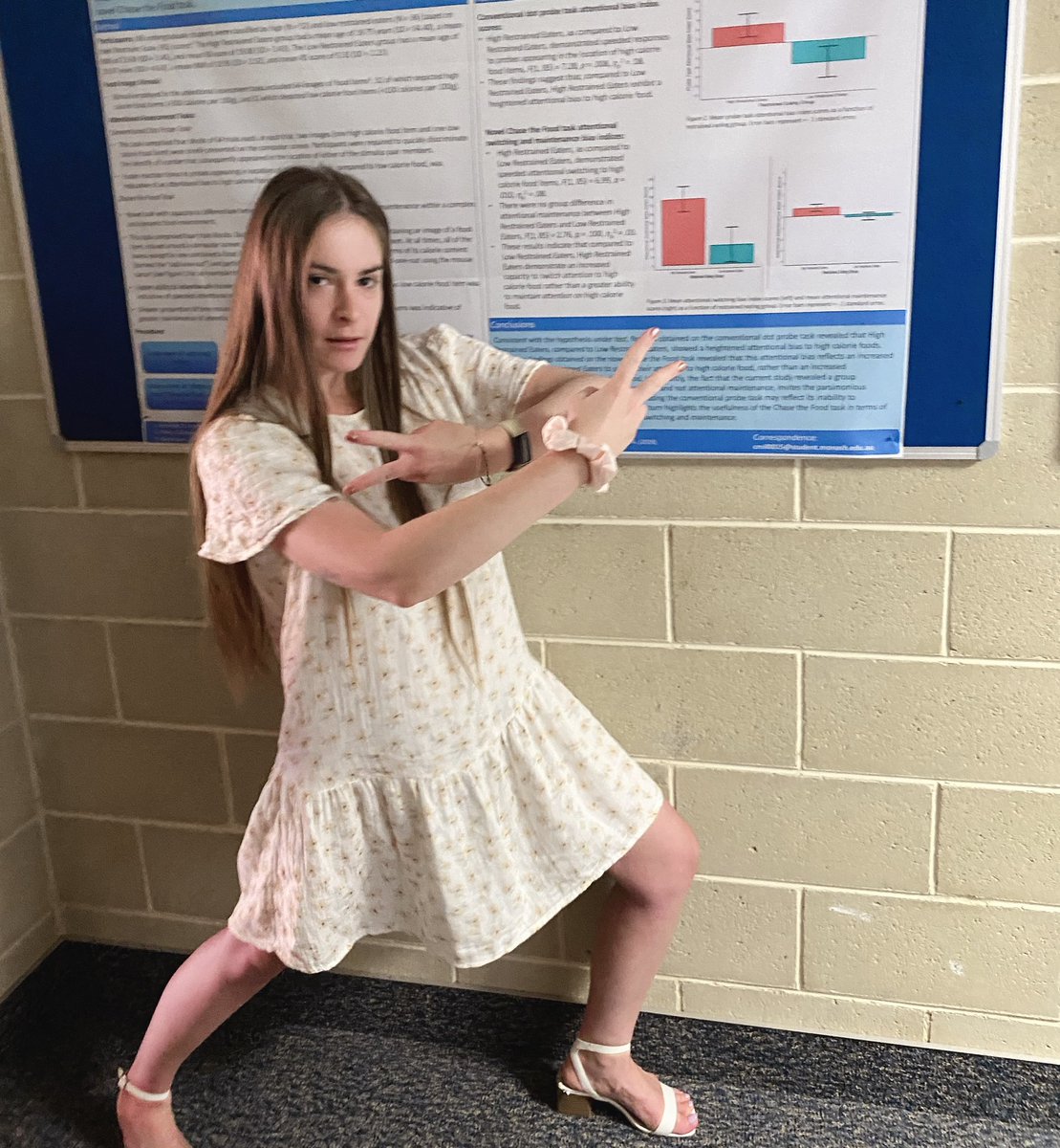 CLMills's tweet photo. Finally got to see my research poster in real life, right outside the @UWA_CARE lab! 🥳 shoutout to my paparazzo and boss lady @LDondzilo 📸 😂 @UWApsych https://t.co/HGL9a0u6FT
