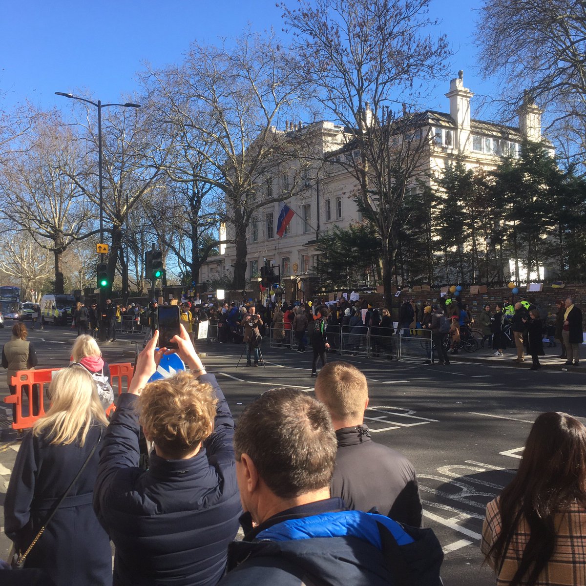 henryhocking's tweet photo. Anti-war protests at Russian Embassy in London. Some douche in his sports car shouts “f*ing hippies”. My esprit d’escalier … should’ve retorted with “f*ing pro-war communist”! https://t.co/zNqleB56zV