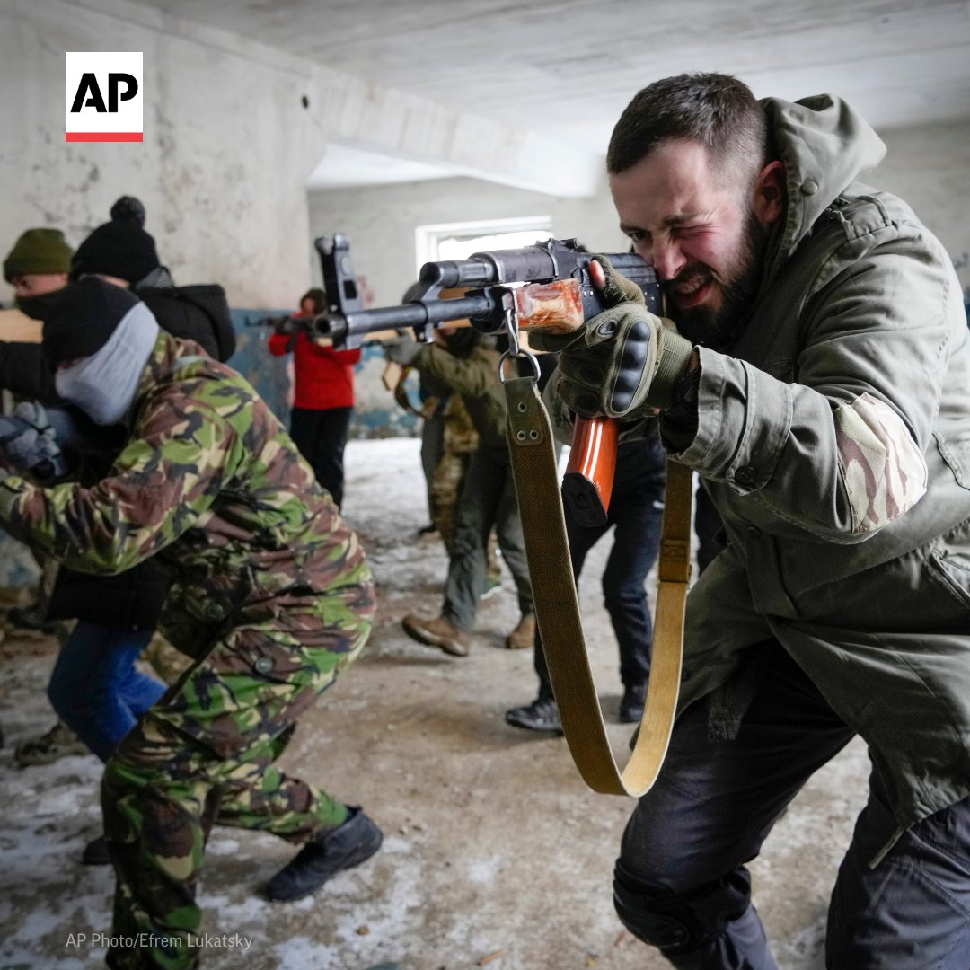 AP's tweet photo. In Ukraine, civilians are taking up arms to defend their country from Russia’s invasion. Some have even returned from abroad to join the resistance.

See more @AP photos: https://t.co/X1X3DR20vX https://t.co/2yEnfx0mC5