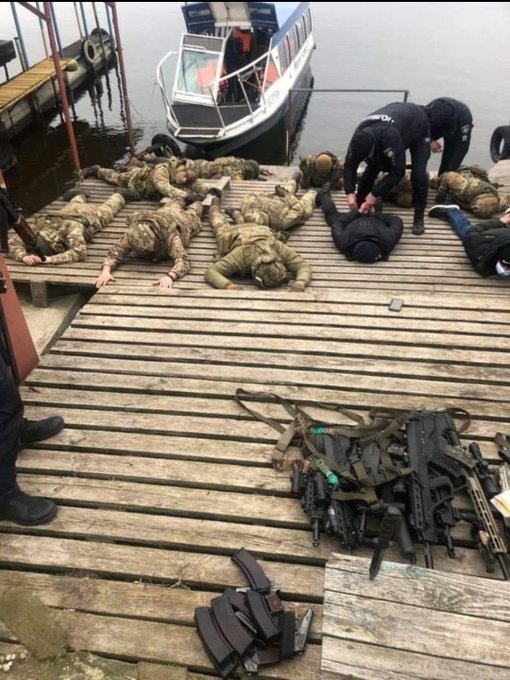 PaulCogan's tweet photo. Russian Spetsnaz (special forces) captured dressed in Ukrainian uniforms in Nikopol, Ukraine. Under the Geneva Convention, they are eligible for execution. https://t.co/qmRq7yJKcx