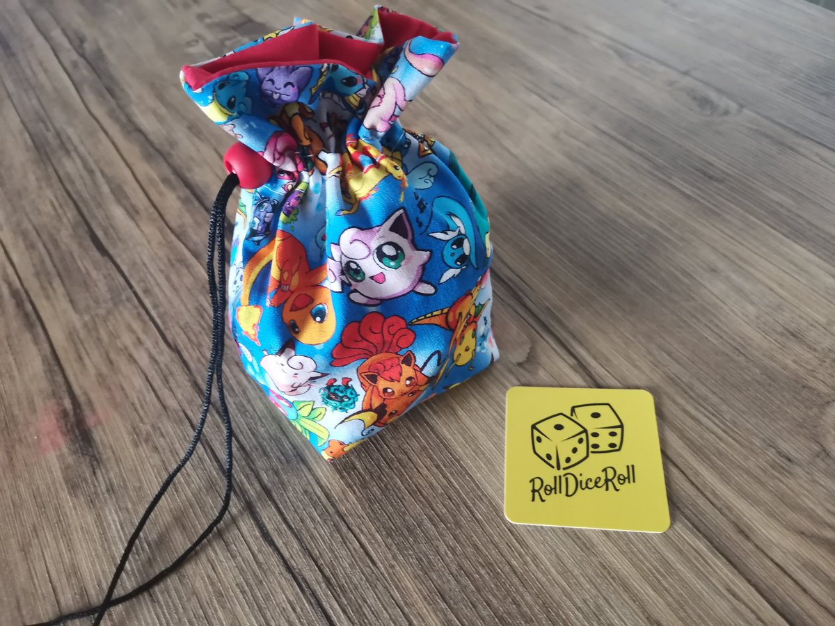RollDiceRoll's tweet photo. My most recent custom dice bag order. Have to say I love the result 🧵🎲 #Pokemon #TCG #dice https://t.co/eYXWDQCXI3