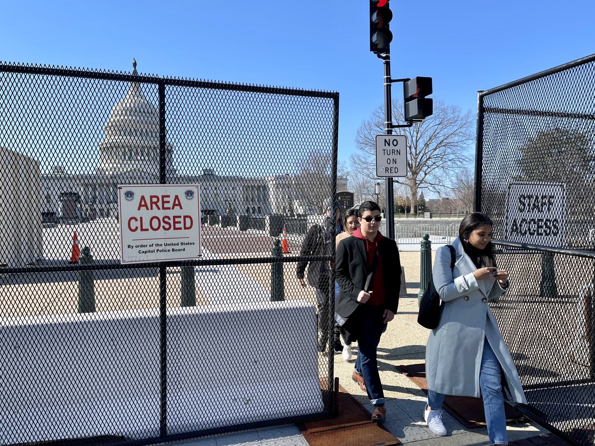 VeganSkaterDC's tweet photo. The #CapitolFence has returned, along with other barriers and security - including #NationalGuard. Precautions are amped up even beyond regular #StateOfTheUnion standards, given concerns about truck convoys and perhaps Putin. 

For now, fence openings allow access to the Capitol. https://t.co/8kR0SqWryu