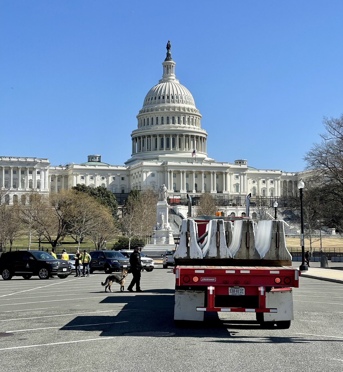 VeganSkaterDC's tweet photo. The #CapitolFence has returned, along with other barriers and security - including #NationalGuard. Precautions are amped up even beyond regular #StateOfTheUnion standards, given concerns about truck convoys and perhaps Putin. 

For now, fence openings allow access to the Capitol. https://t.co/8kR0SqWryu