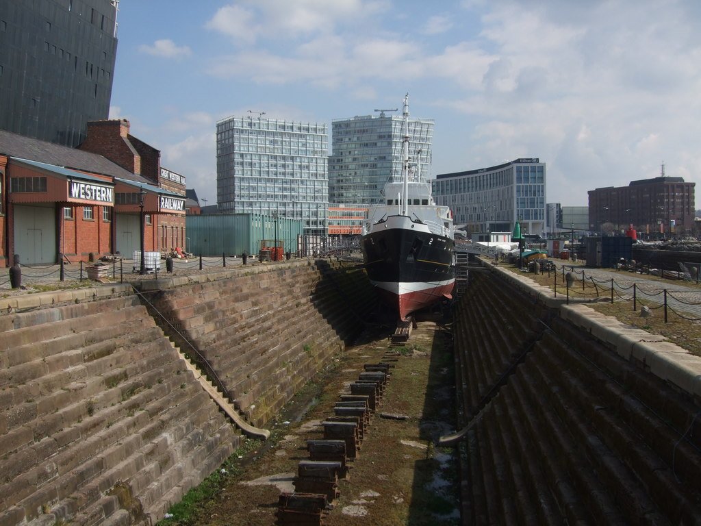 Graving dock, Liverpool. When ships' hulls were cleaned copper nails and wire would fall into the mud. At every low tide during the 1840s, hundreds of starving Irish people could be seen scouring the bottom of the dock trying to find any copper they could carry away and sell.