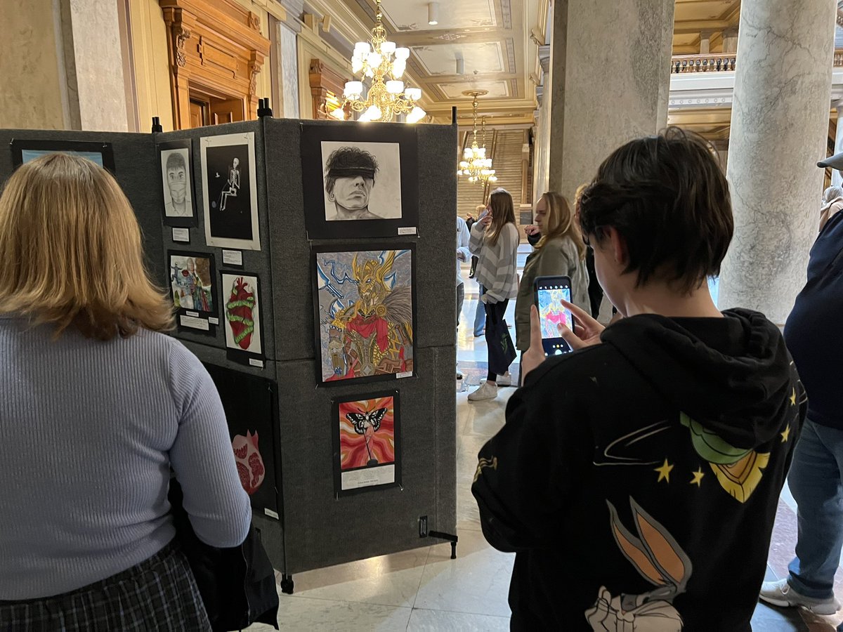 CGawNPHSArt's tweet photo. A great #artadvocacy day at the Indiana State Capitol today! So much fun observing folks reaction to Brannon Crull’s warrior drawing at the #YAM 2022 student art celebration! @rcrull @SouthernHancock @VoelzJames #creativity #newpalproud NPHS Art students are going to town! https://t.co/Wimrg63y6I