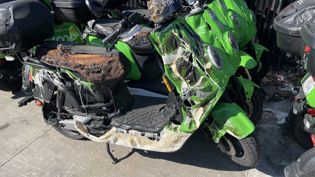 pwbuehler's tweet photo. About a dozen melted Lime scooters in Bushwick outside their storage lot on Ingraham St- I wonder if it was the batteries.  @limebike #bushwick https://t.co/ltmzeSEKae