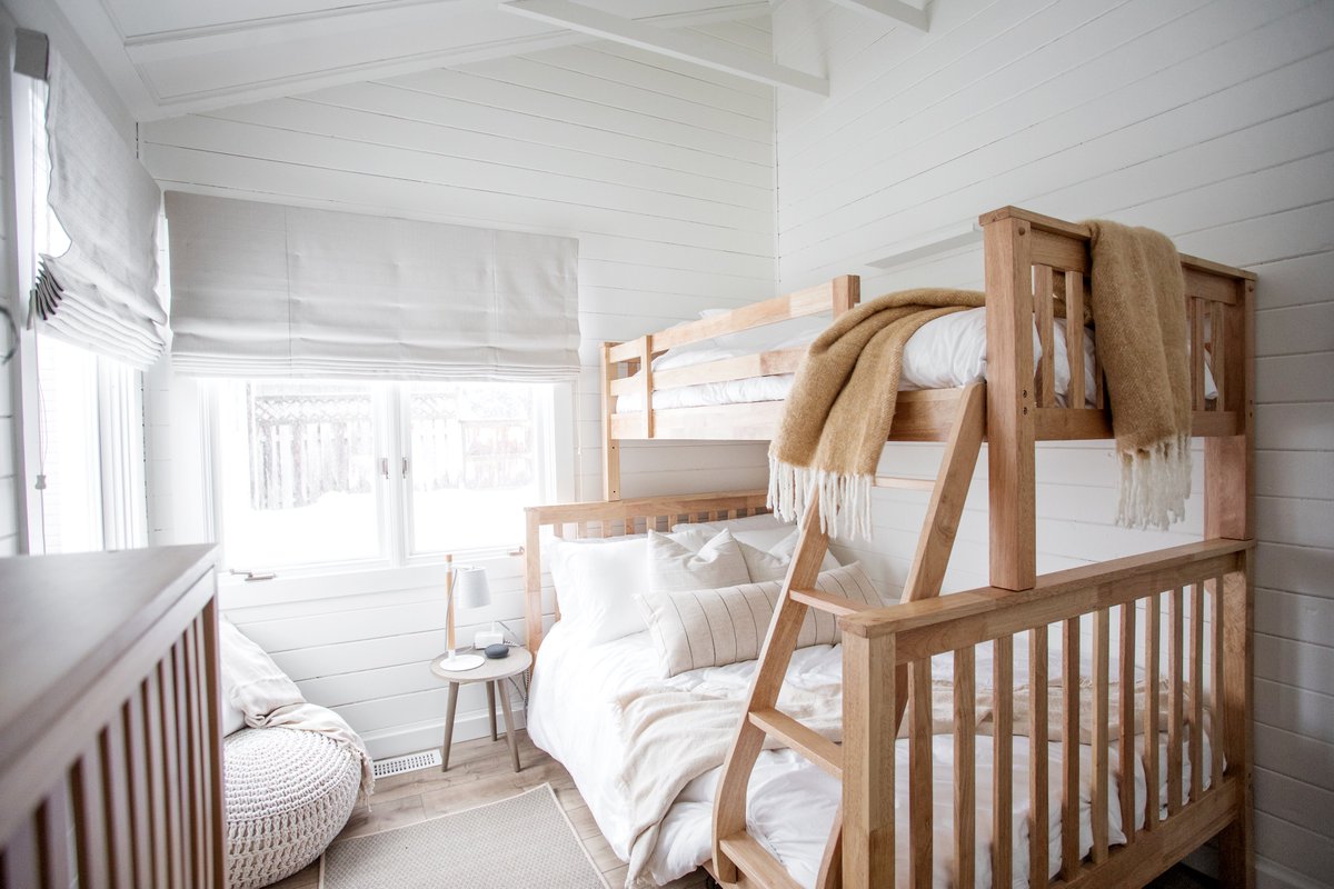 We made sure that bedroom 2 at The Hideaway is perfect for families. A sturdy bunk bed, made in Canada, with a Full size mattress on the bottom (slightly smaller than Queen, still great for 2 adults) and a Twin on the top.