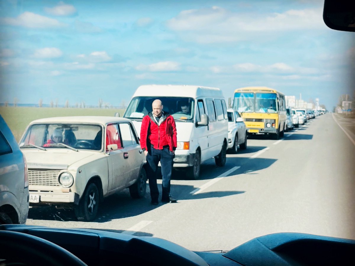 Traffic jam outside a ukrainian city. A common scene since war began #ukraine #checkpoint #lada #traffic #line #road #waiting #warzone #france24