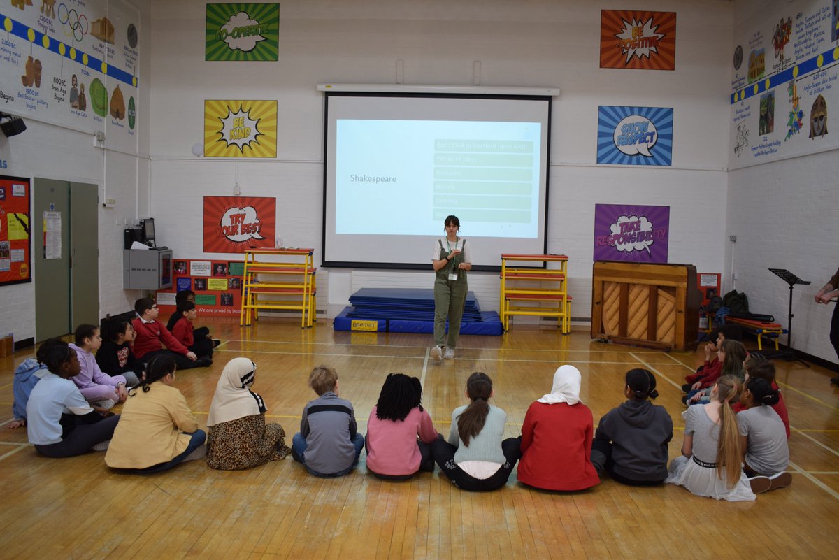 JBprimaryschool's tweet photo. It's great having @bigfootarts in school today providing Introduction to Shakespeare sessions to Y2-Y6.  The children are loving these interactive sessions and getting into Shakespeare characters.  We certainly have some budding actors here at John Burns! @The_Globe 😀👏 https://t.co/lcD4cEYgKB