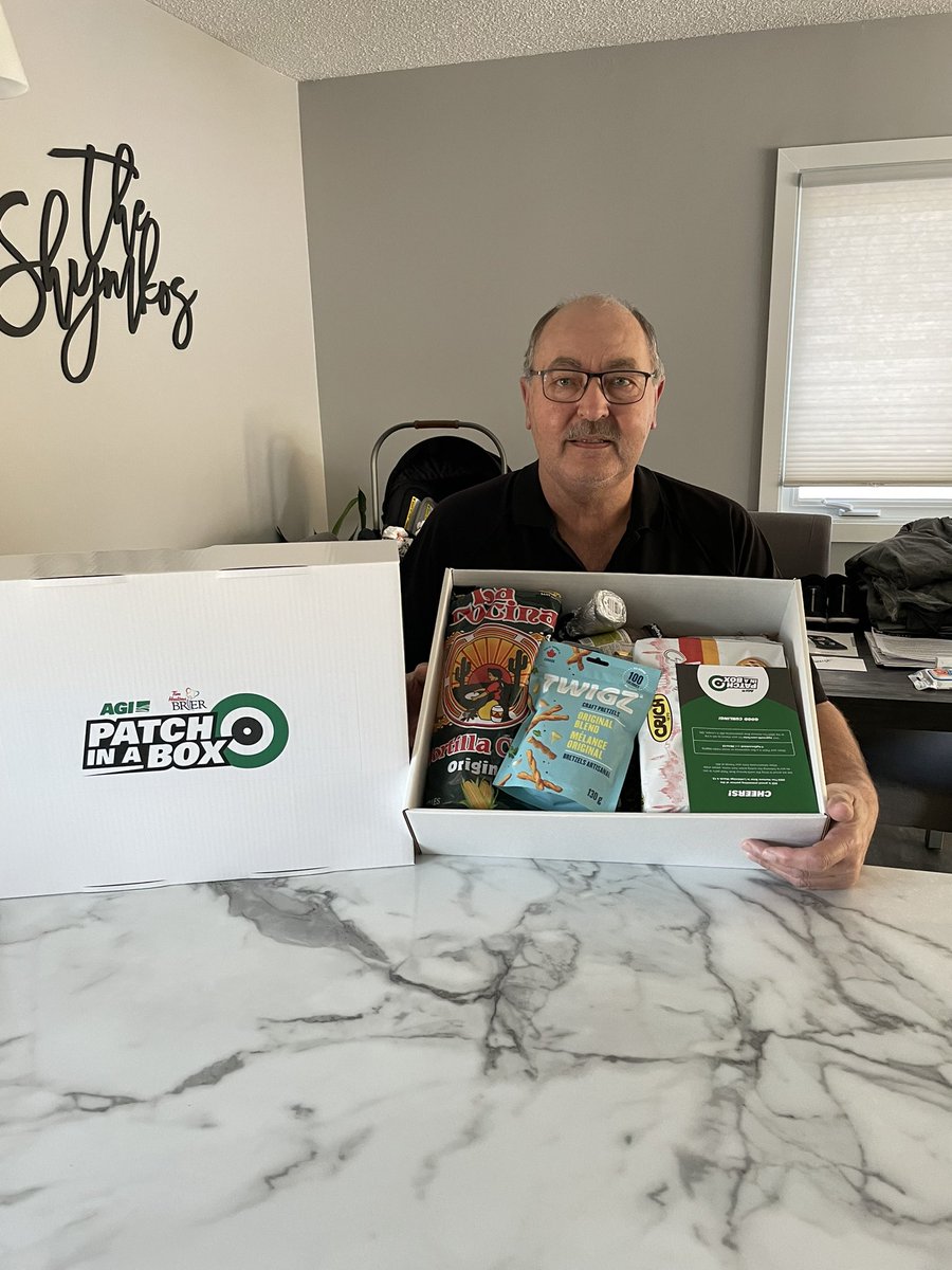 shymmer33's tweet photo. It’s that time of the year again, with the @AgGrowthIntl “Patch in a Box” being handed out before the start of the @CurlingCanada Brier!! #SnackTime #2022Brier #GoSask https://t.co/rpWxOxvX9E