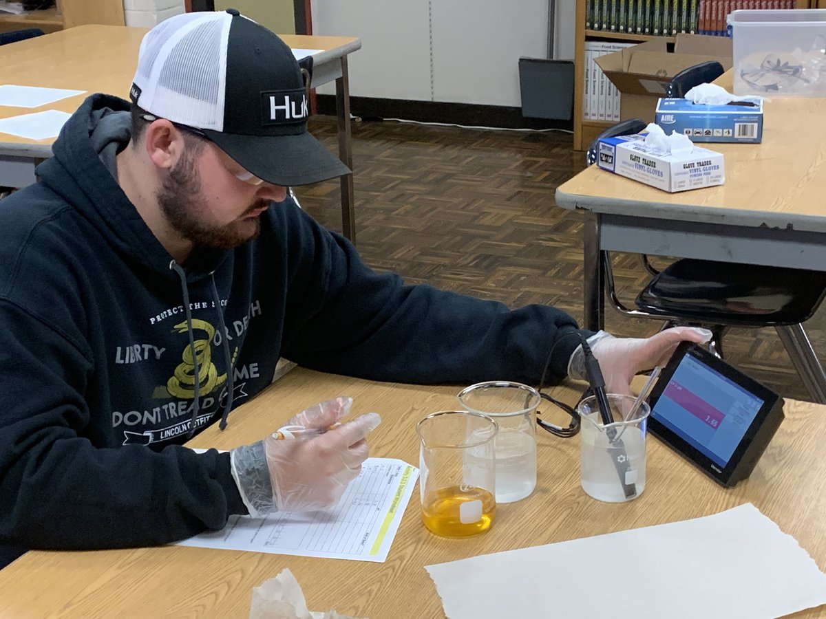 Measuring pH of 7 liquids to determine if they are Acids or Bases in Agriscience!