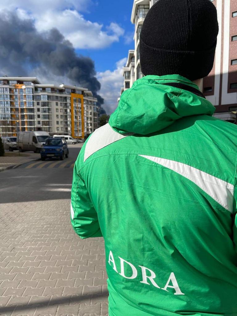 Over the weekend, ADRA Romania (<a href="/adraro/">ADRA ROMANIA</a>) began organizing one of the first humanitarian convoys into #Ukraine. The team deployed on Sunday morning. The photo below shows an ADRA team member in Hostomel, Ukraine. 

Read below for details 🔽