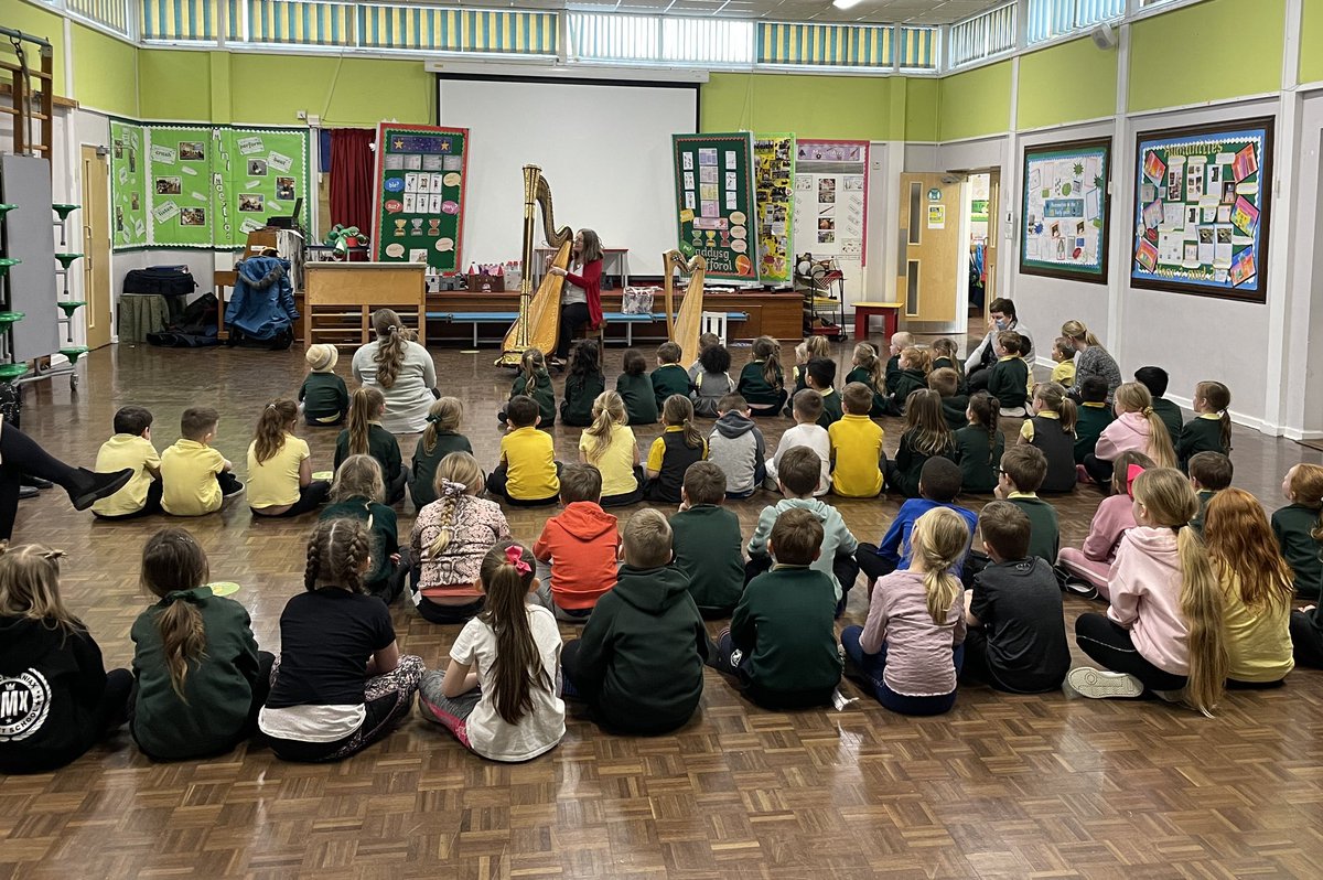 AYFprimary's tweet photo. Foundation Phase had the privilege of listening to traditional Welsh songs being played on a harp this afternoon. We sang and danced along to the music. Dydd Gŵyl Dewi Sant.  @CSC_FP @CSC_ExpArts @CymraegCampus https://t.co/SIgKrELCJY