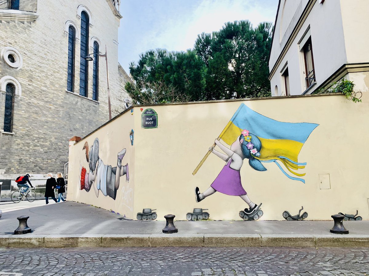 jminguell's tweet photo. The streets in #Paris are also with #Ukraine. Painting by Seth. https://t.co/TOjGjYb1Jm