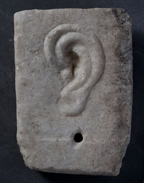 A 4th cent BCE anatomical votive relief depicting an ear.Found at the Sanctuary of Asklepios (god of medicine),on the slopes of the Athenian Acropolis.This would have been left by someone hoping for an ear problem to be cured or in gratitude to the God for having delivered a cure