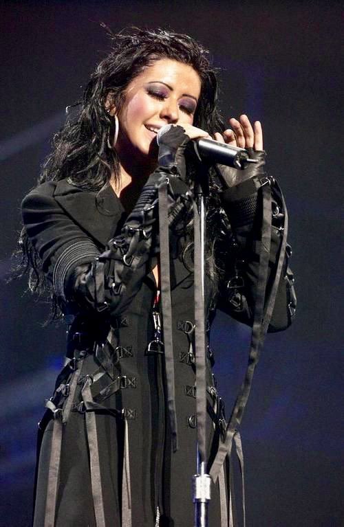 XtinaLoverr's tweet photo. xtina wearing custom versace for the stripped tour (2003) https://t.co/TxsII37khG