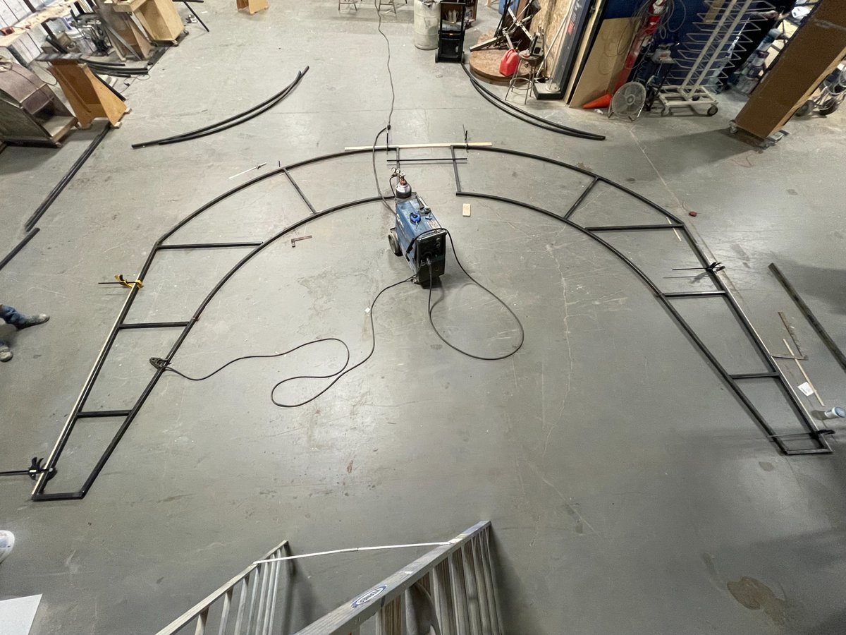 MuseumArts's tweet photo. Our #Fabrication Team is hard at work building this archway that acts as a gate. It will be installed at a local #Zoo here in Dallas for a special exhibit. The archway also swings open so larger vehicles can get through. #Welding #Metalwork #Parks #SignBuilding #ExhibitDesign https://t.co/nxigGZWKzu