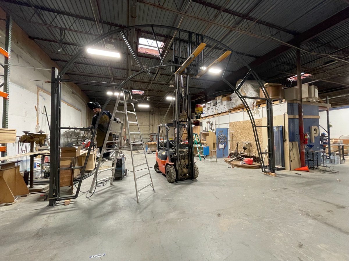 MuseumArts's tweet photo. Our #Fabrication Team is hard at work building this archway that acts as a gate. It will be installed at a local #Zoo here in Dallas for a special exhibit. The archway also swings open so larger vehicles can get through. #Welding #Metalwork #Parks #SignBuilding #ExhibitDesign https://t.co/nxigGZWKzu