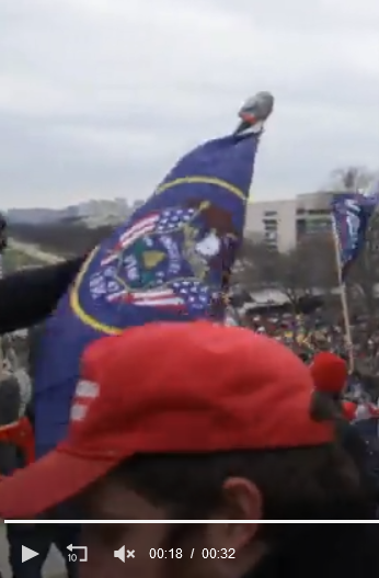 DianthaSol's tweet photo. @JusticeCat0106 found a friend of #BadBellhop, holding the crappy broken snow shovel flagpole (later used at #MonumentAttack as makeshift spear with knife) and standing in front of him! Also, I lost track of what flag this is? h/t @creek_twit https://t.co/zcFtJSY88x