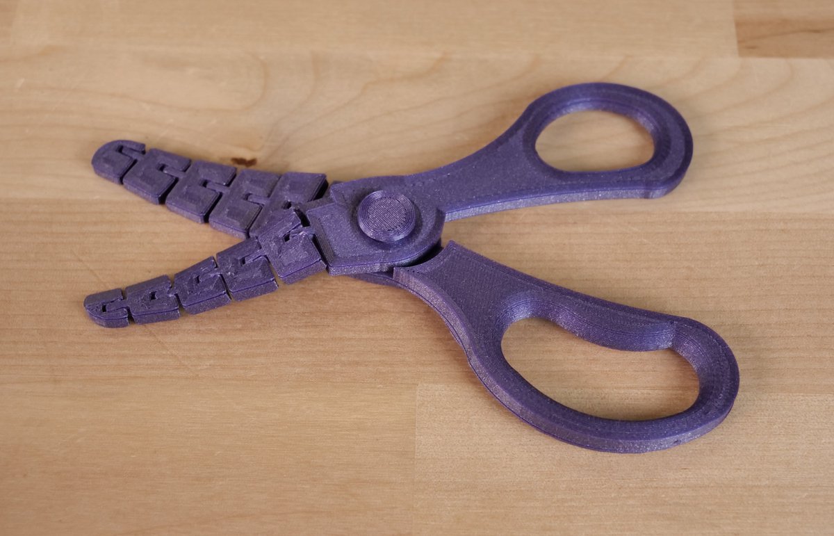 My favorite model from 2021, gave to my daughter after she lost her scissors.  Articulated Scissors by <a href="/Shrubzy/">Shrubsy</a> in <a href="/Proto_pasta/">Protopasta</a> Dragon Scale Purple HTPLA