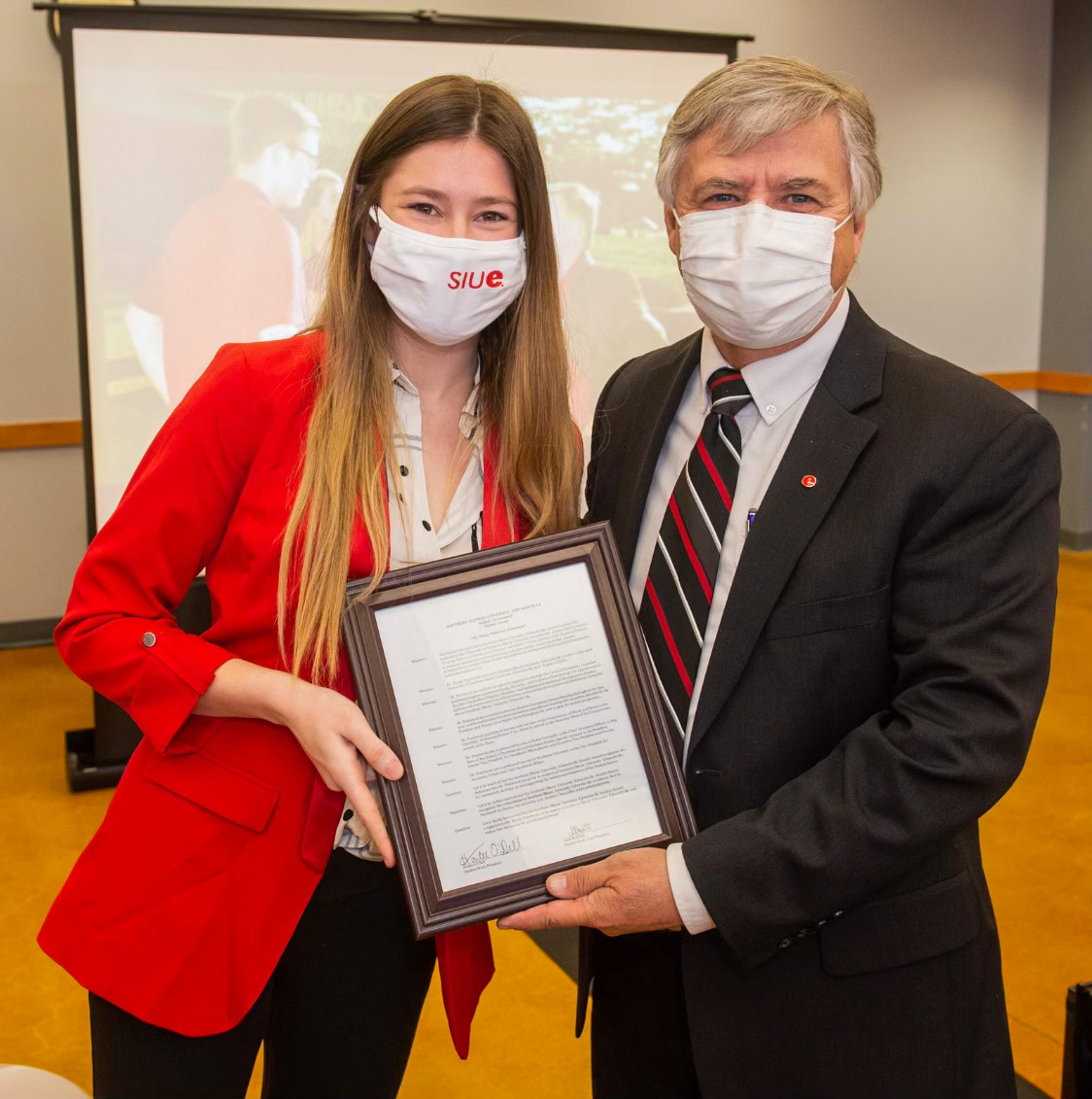 SGsiue's tweet photo. In honor of Dr. Pembrooks retirement, on February 25, President Hailee O'Dell presented the resolution that Student Government passed. This resolution recognized his achievements at SIUE which furthered the universities mission and values. We wish Dr. Pembrook a great retirement. https://t.co/WYxkiQP8jA