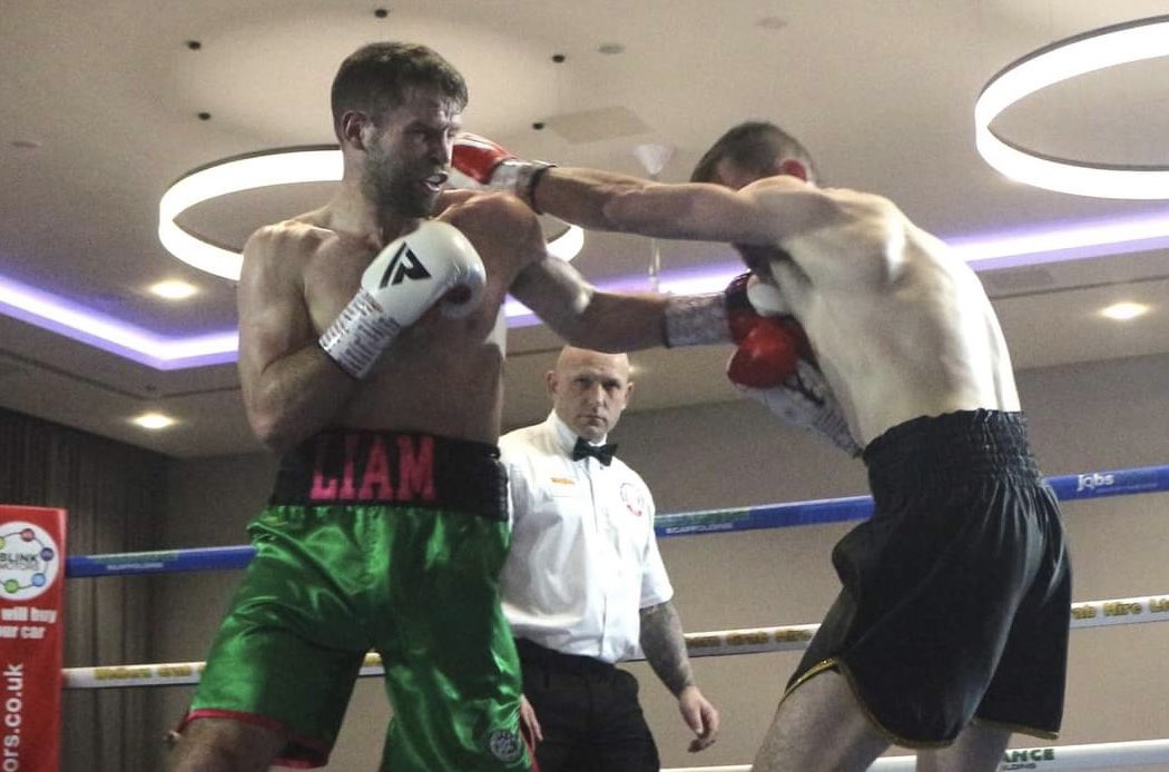 Habsmonmouth's tweet photo. A former student @MonSchBoys has won his second professional boxing contest.
Old Monmothian, Liam O’Hare, defeated Josh Hodgins in Birmingham.
Liam (wearing green shorts and white gloves) recorded an emphatic 40-36 victory in a lively contest. #twowinsfromtwo #welldone https://t.co/T4X8Pz45LX