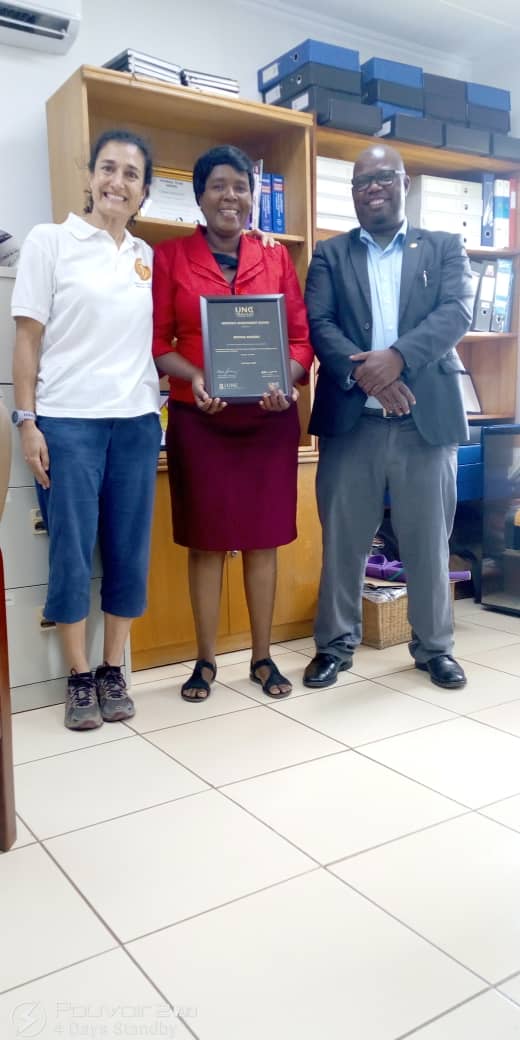 Mina_MD_UNC's tweet photo. Happy to have Bertha back 'home' @UNCMalawi to receive her scientific achievement award for her first authored publication from 2021. And knowing she has a 2022 manuscript looming, I'm very proud of her. #MHIRST program. https://t.co/rIrN8pe2Cj