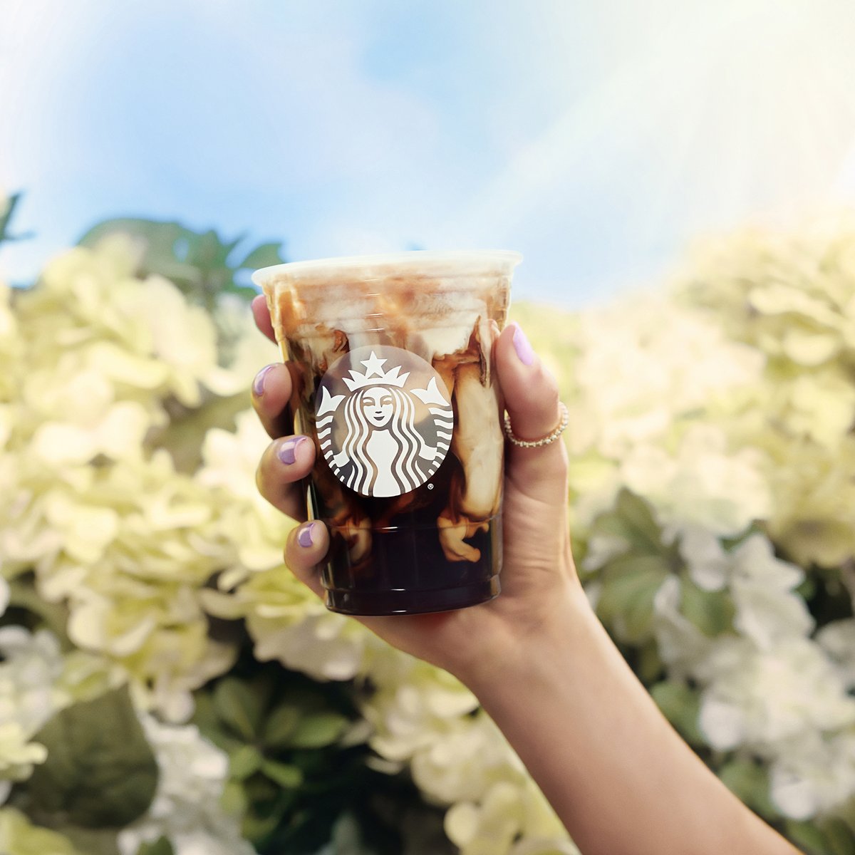 Starbucks's tweet photo. Meet the new Iced Toasted Vanilla Oatmilk Shaken Espresso—with layers of rich caramelized vanilla flavor, it’s like vanilla with a glow up. ✨ (US &amp; Canada) https://t.co/4ZfAAQK2UW