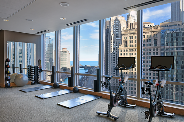 We understand the importance of maintaining a healthy lifestyle while traveling. Elevate your fitness with our state-of-the-art fitness club, surrounded by inspiring views of the Chicago River and Lake Michigan. #TheSpaatTrump