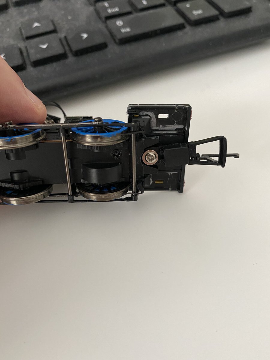 Norton_Junction's tweet photo. @Modrail @TheUnluckyTug No worries! 
I’m reluctant to glue the NEM pocket in place, so have had to completely butcher the body and cab to be left with the die cast base, to be able to screw the pocket onto. Then I’m able to fit the E2 body over the top of it.  But it doesn’t look great from low level 😑 https://t.co/PSnQAmVXCD