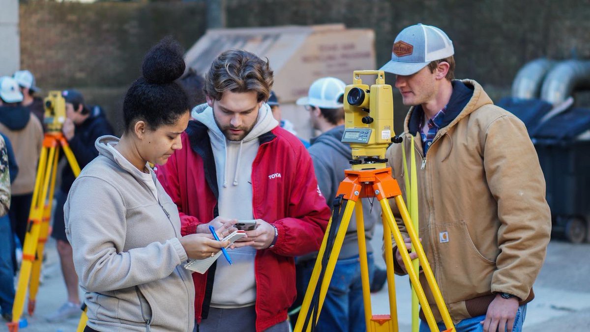 TAMUArchCollege's tweet photo. Construction science students using field calculation equipment work on a surveying assignment in the breezeway between Langford A, B and C.
@TAMUCOSC @TAMU #constructionscience #surveying #tamucosc #hardhats https://t.co/sDgORLCHNb