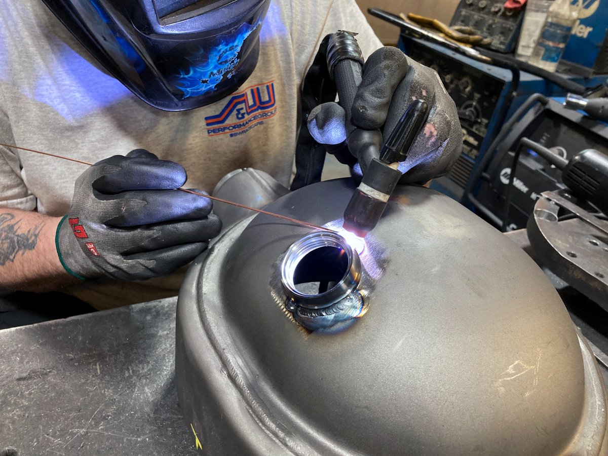 Most of our performance street and competition grade products are either MIG or TIG welded, in-house. Mike is pictured welding a fill bung, machined by our full service machine shop, onto a rear housing. #swperformancegroup #swracecars #madeintheusa #dragracing #tigtuesday