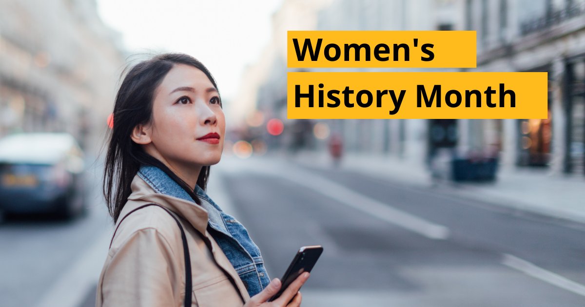Asian woman looking happily up into the sky, text reads: "Women's History Month" with bold yellow banner