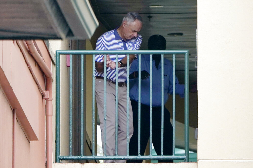 Perfect photo just came from AP: Rob Manfred practicing his golf swing with a story reporting PA's rejection of owners' latest proposal.