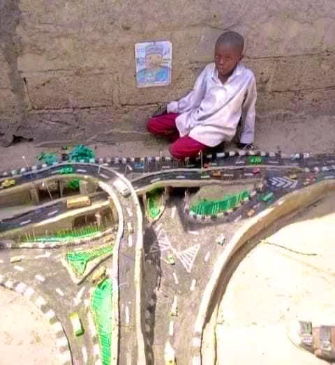 muhdzulum's tweet photo. One thing about Borno state is that we are blessed with talented people, this young boy in Gwange II ward sabon garri recreated the stunning flyover made by Prof. Zulum in Maiduguri.
Kudos to him. https://t.co/KUb5V8mdU4