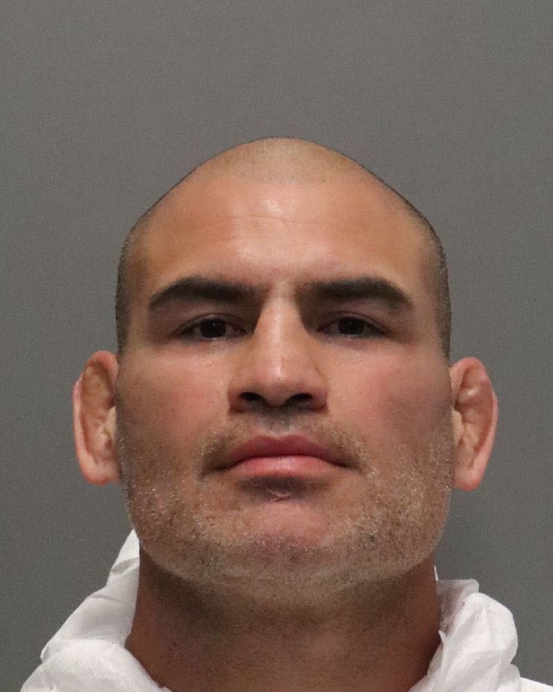 MMAHistoryToday's tweet photo. Cain Velasquez’s mugshot after being arrested for attempted murder. 

(The wildest caption we’ve ever written) https://t.co/TCfeyeQfxd