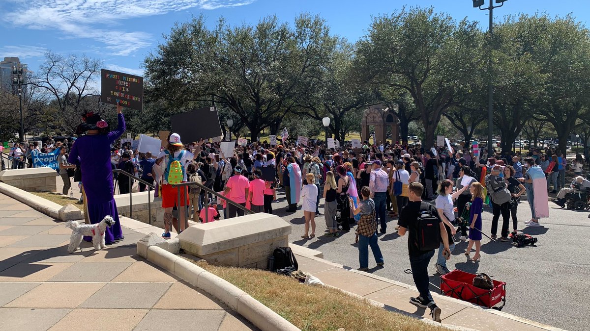 Trans youth, families and allies attend rally at the state capitol building in Austin, TX.