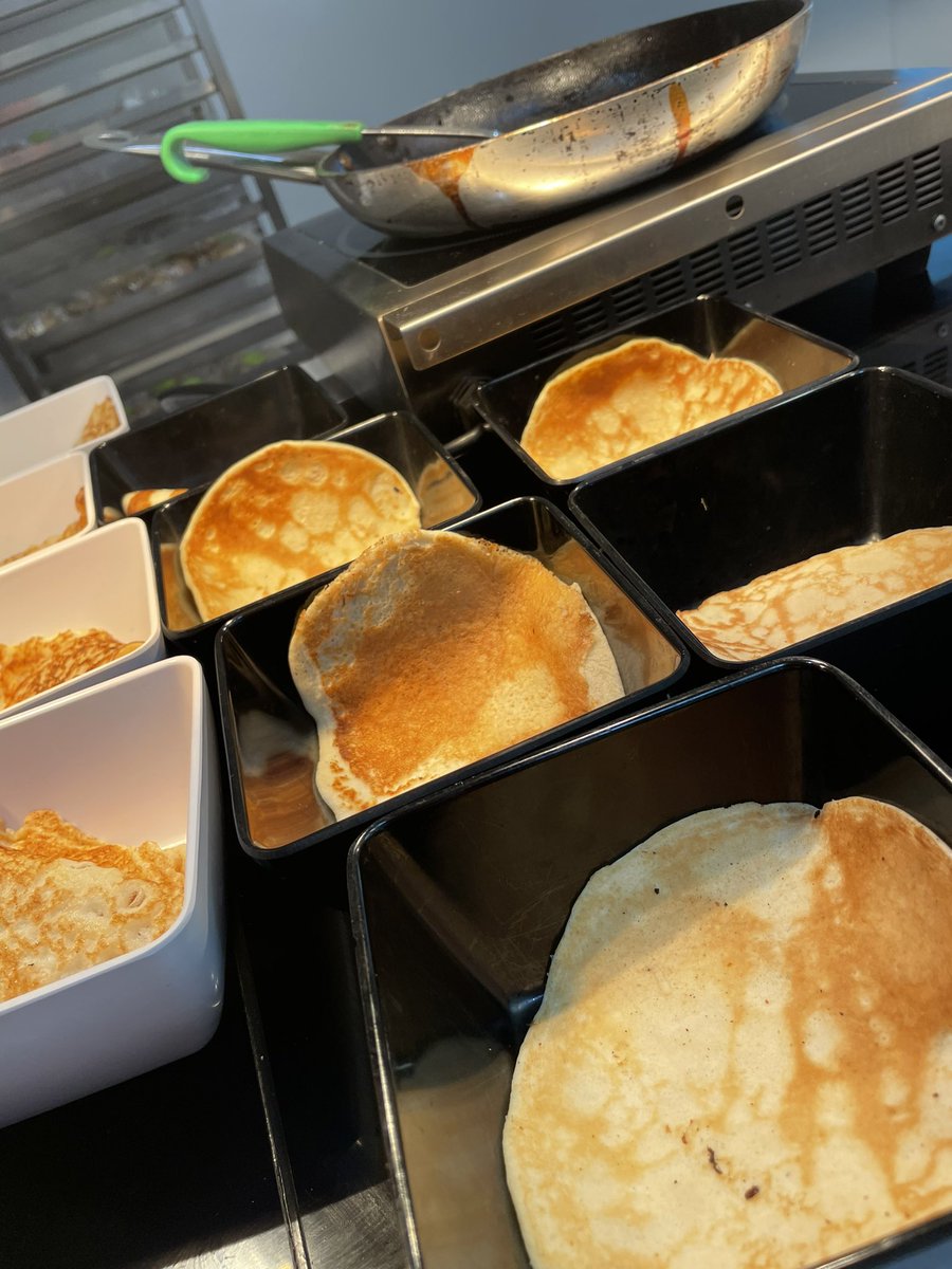 Great pancakes some made on the counters all handmade regular and vegan choices #lovepancakes toppings of blueberries chocolate and strawberry sauces or simply lemon and sugar what’s your preference 👨‍🍳