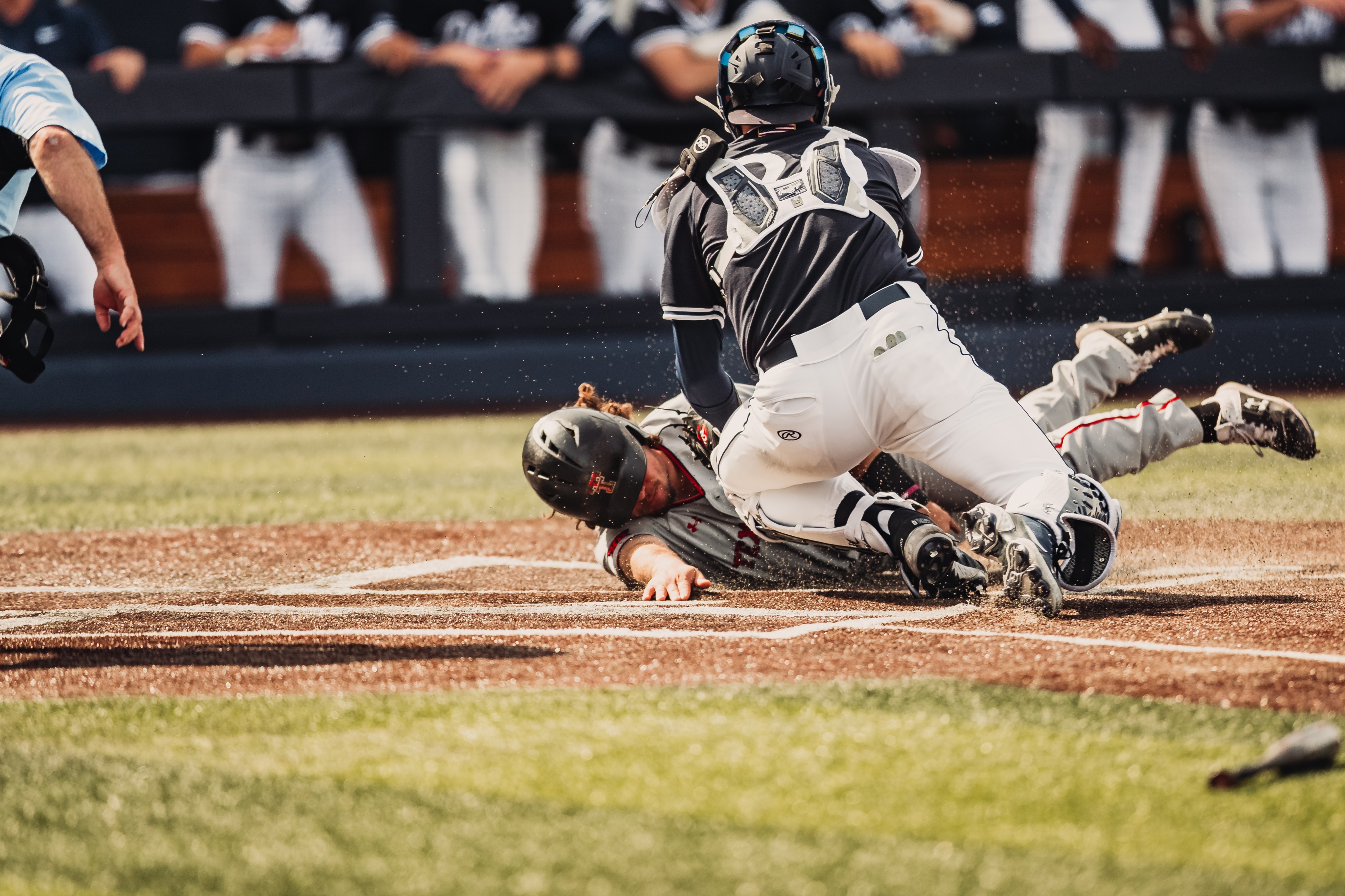 Texas Tech's Ty Coleman slides into home for a 1-0 lead. 