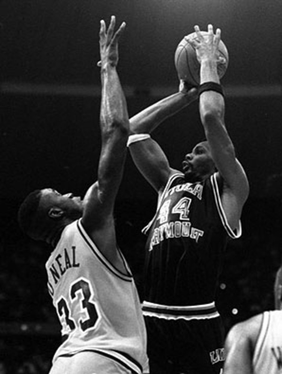 Hank Gathers taking on Shaq. Hank ended the game with 48 points and 13 rebounds to Shaq's 20 points and 24 rebounds in a close LSU OT win