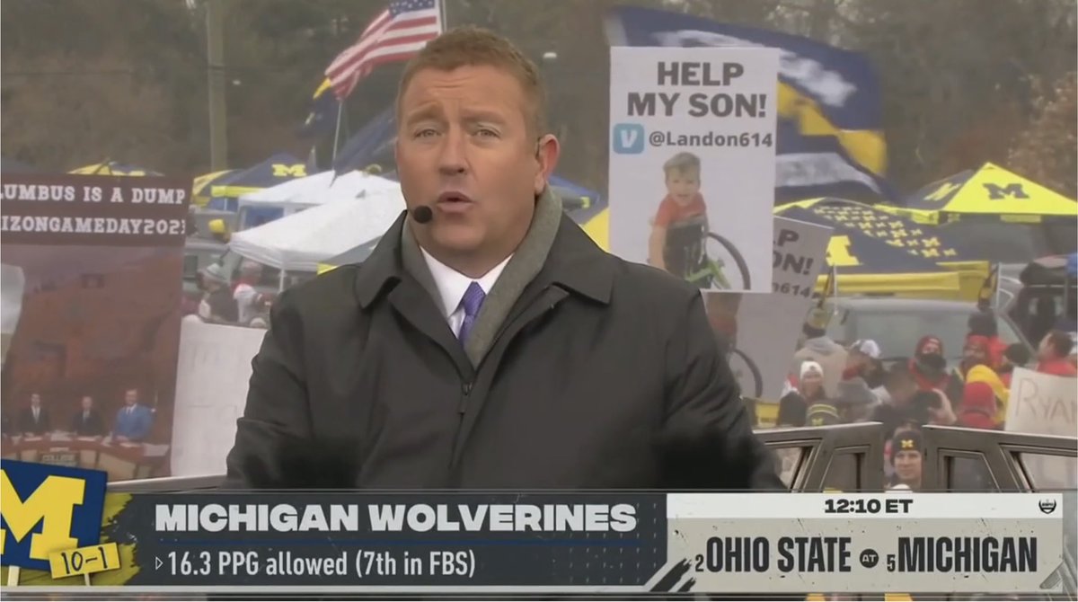 ramzyn's tweet photo. The story behind the boy in this sign behind Kirk’s head is worth a click https://t.co/8MFJXFr0zC https://t.co/l1zVwm5Z7k