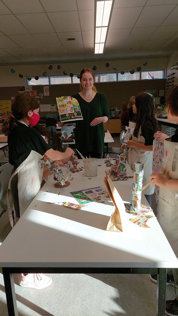 Grade 4 students working on their whimsical sculptures with Ms Maxwell.