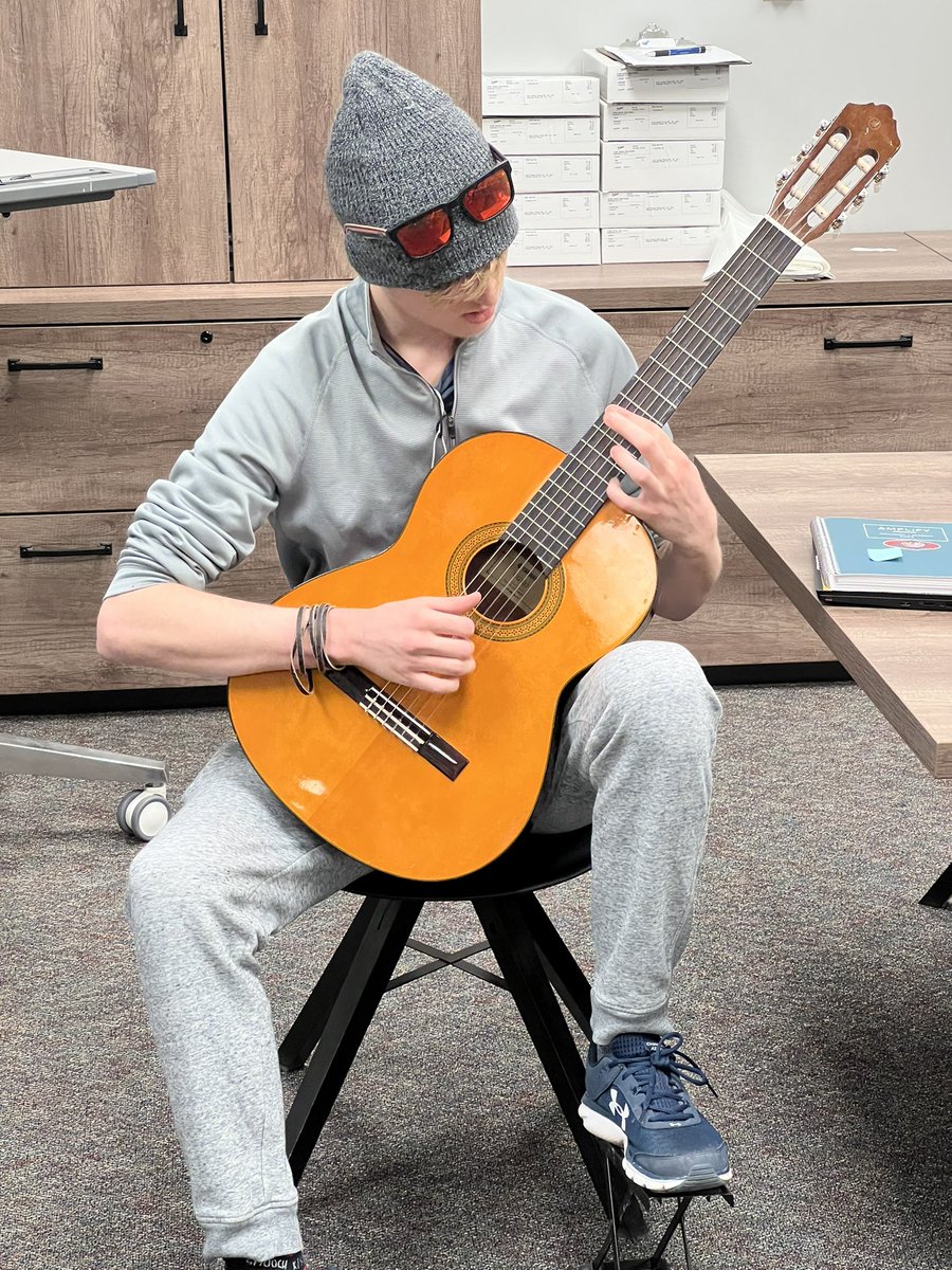 The main office being serenaded by Riley. Wish him luck on his assessments on Friday.